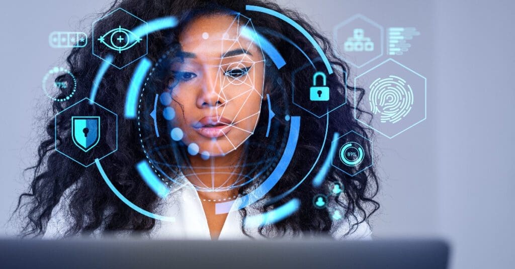 mulher-afrodescente-usando-laptop-com-interface-de-autenticacao-e-biometria